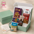 Classic Mithai Box by Wrap Shap featuring date bites, Eat Better laddoo, cashews, almonds, a handwritten thank-you card, and elegant gift box packaging for Raksha Bandhan return gifting.