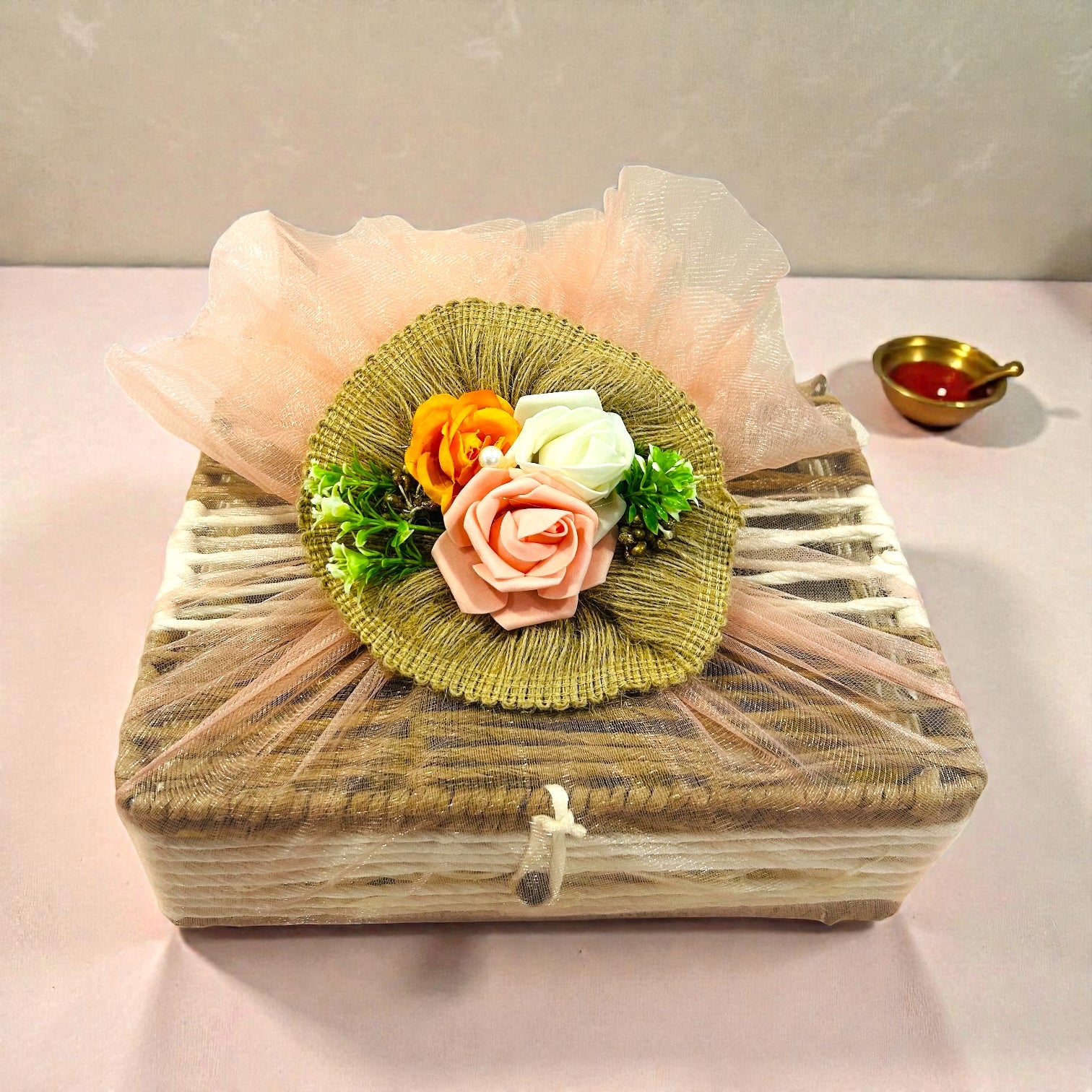 Traditional pooja return gift hamper with candle