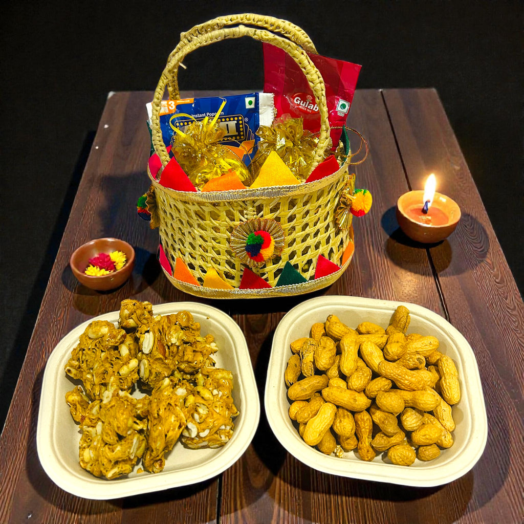 Lohri return gift hamper for first Lohri celebration with gajak, revdi, moongfali and popcorn in small basket.