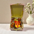 Wedding return favour with Ganesh Ji statue packed in a premium gift box.