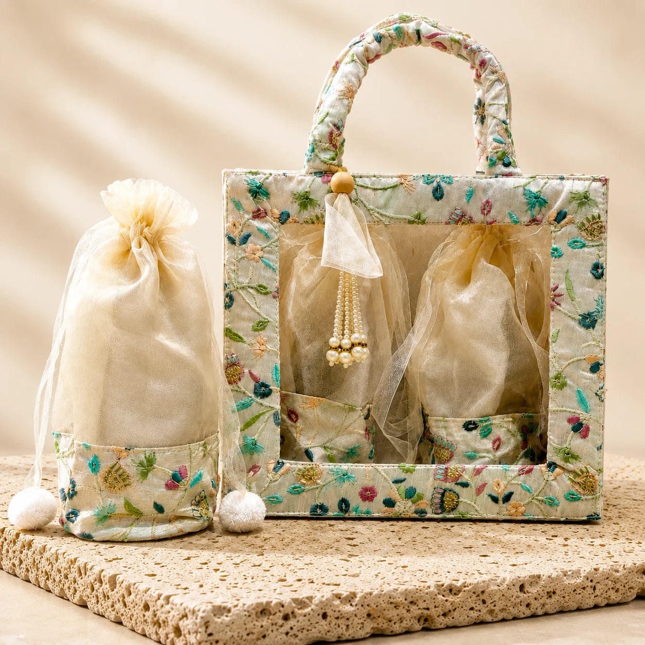 Premium Garden Print foldable hamper basket with two matching round potli bags for wedding, festive, and corporate gifting. Luxury kappa gift basket measuring 10x9x5 inches with reusable round potli bags for dry fruits, chocolates, sweets, jewellery, and premium hampers