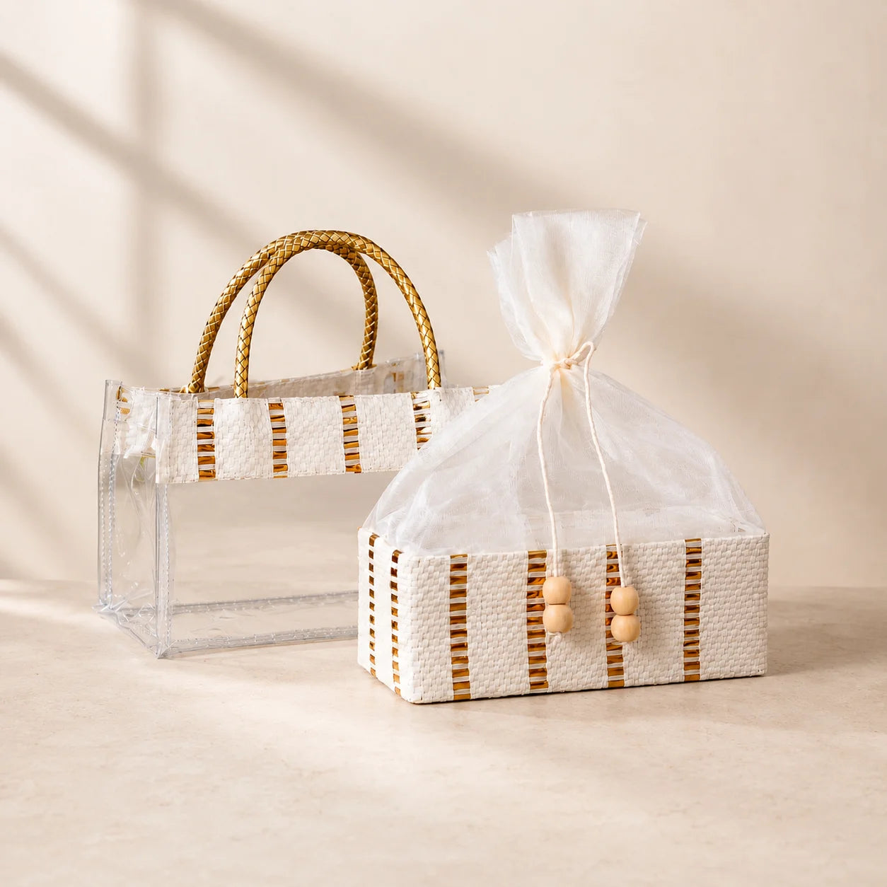 Premium Gold basket with transparent PVC bag made from MDF for festive gifting, wedding hampers, and corporate gift packaging. Elegant gold hamper basket available in 2 Jar and 4 Jar sizes for dry fruits, chocolates, sweets, gourmet treats, and luxury gift presentations