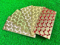Premium paper shagun envelope with gold foil leaf print for wedding cash gifting