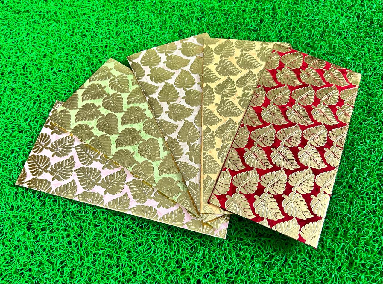 Premium paper shagun envelope with gold foil leaf print for wedding cash gifting