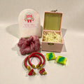 Haldi Mehendi return favour for ladies with bangles, scrunchies and handmade chocolates in leatherette box.