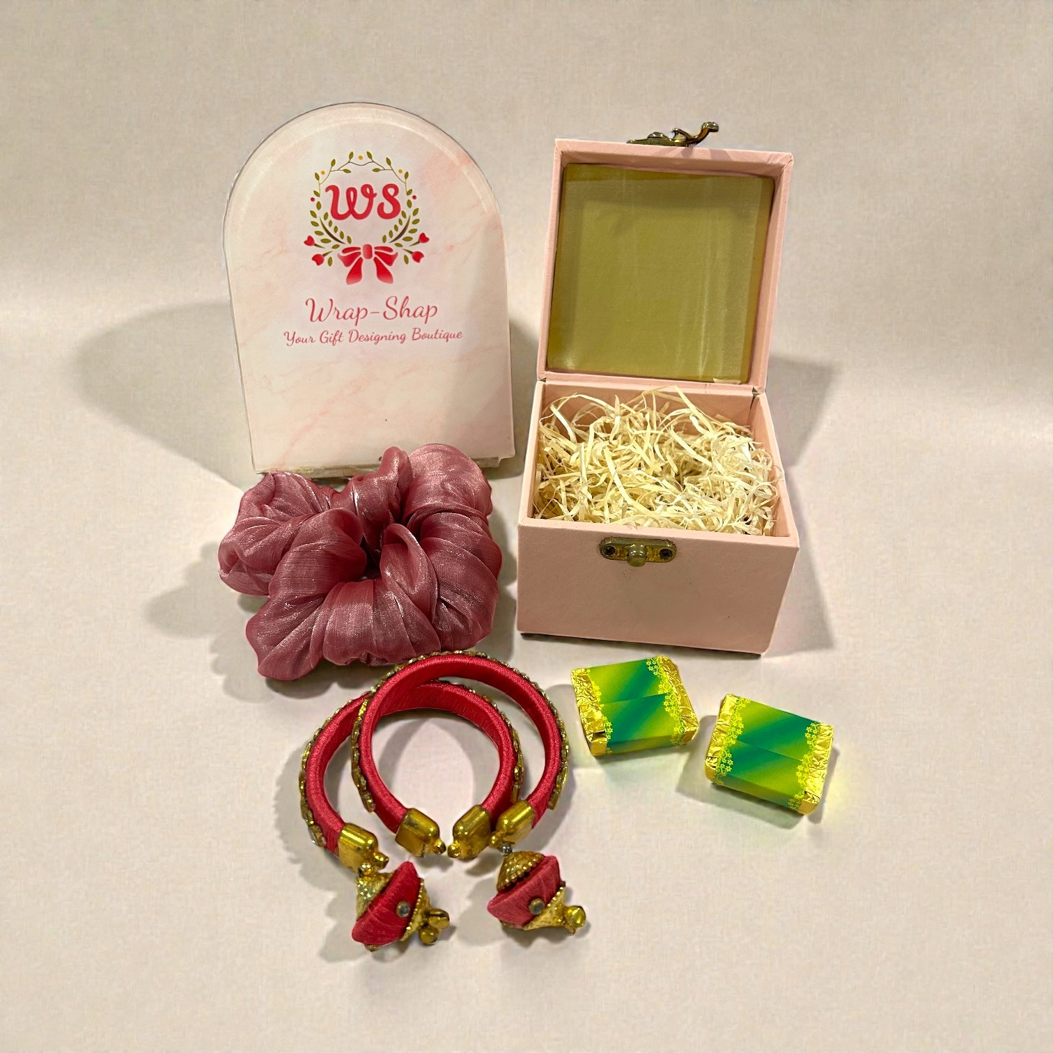 Haldi Mehendi return favour for ladies with bangles, scrunchies and handmade chocolates in leatherette box.