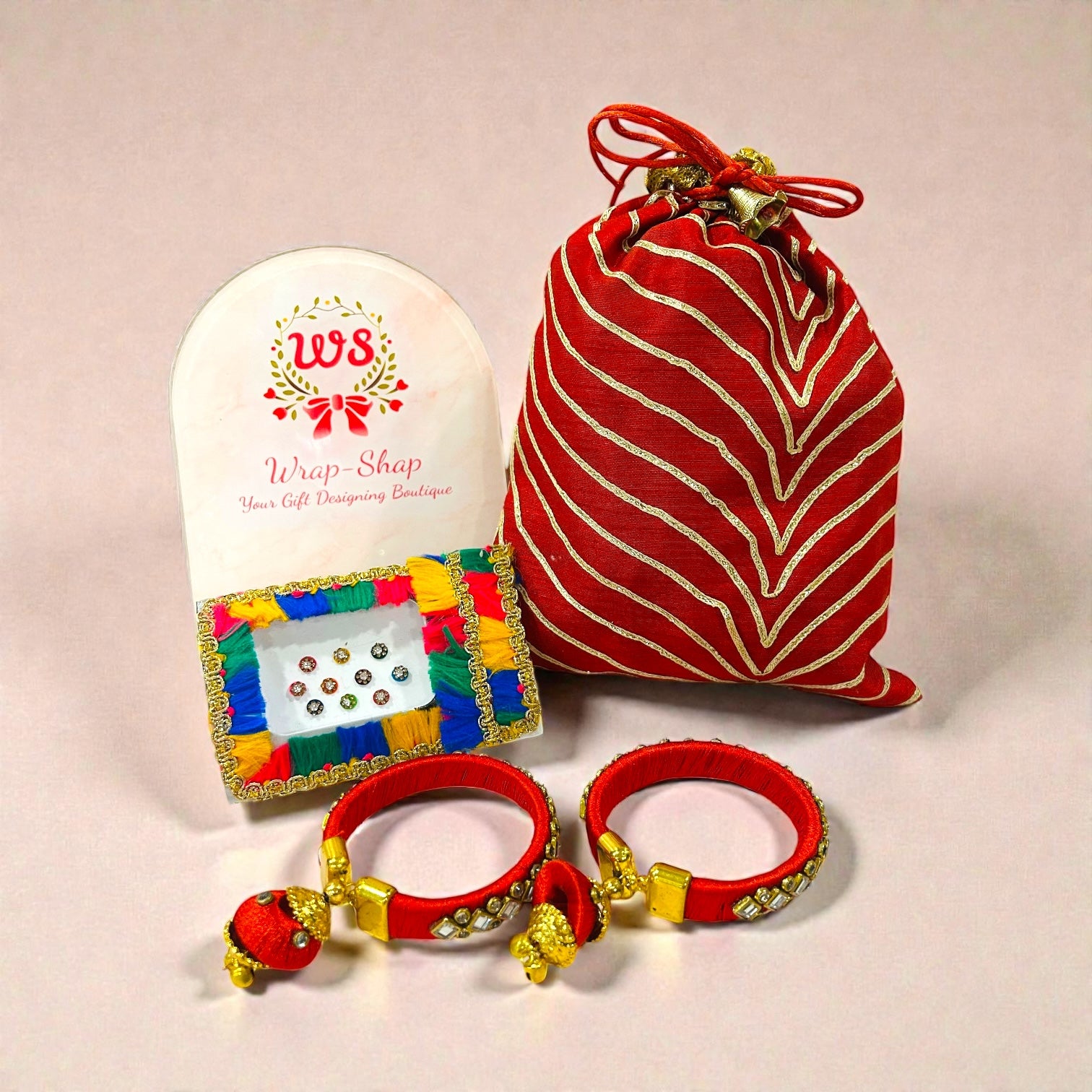 Haldi Mehendi wedding return favour for ladies with bindi set and bangles in potli bag.