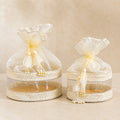 Premium jute hamper potli bag with sturdy base and decorative tassel closure for wedding, festive, and corporate gifting. Designer round jute gift bag available in 8x8 and 10x10 inches for dry fruits, chocolates, sweets, gourmet hampers, and luxury gift packaging