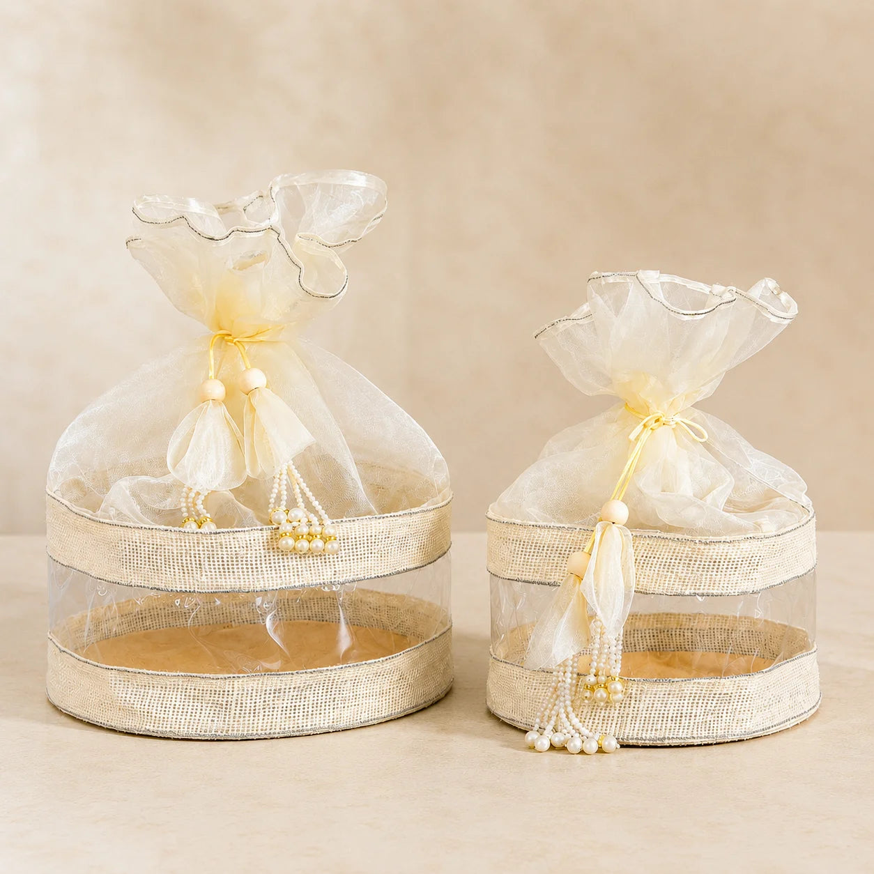 Premium jute hamper potli bag with sturdy base and decorative tassel closure for wedding, festive, and corporate gifting. Designer round jute gift bag available in 8x8 and 10x10 inches for dry fruits, chocolates, sweets, gourmet hampers, and luxury gift packaging