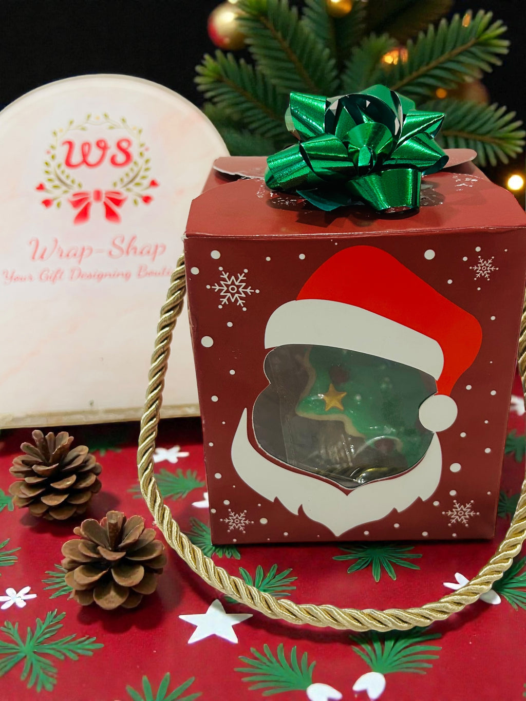 Kids Christmas gift hamper featuring Christmas cookies and themed doughnut.