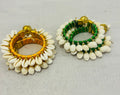 Set of 2 ethnic Kodi Bangles in assorted colors, made with natural shells, perfect for Haldi, Mehendi, wedding return favors, and festive gifting.