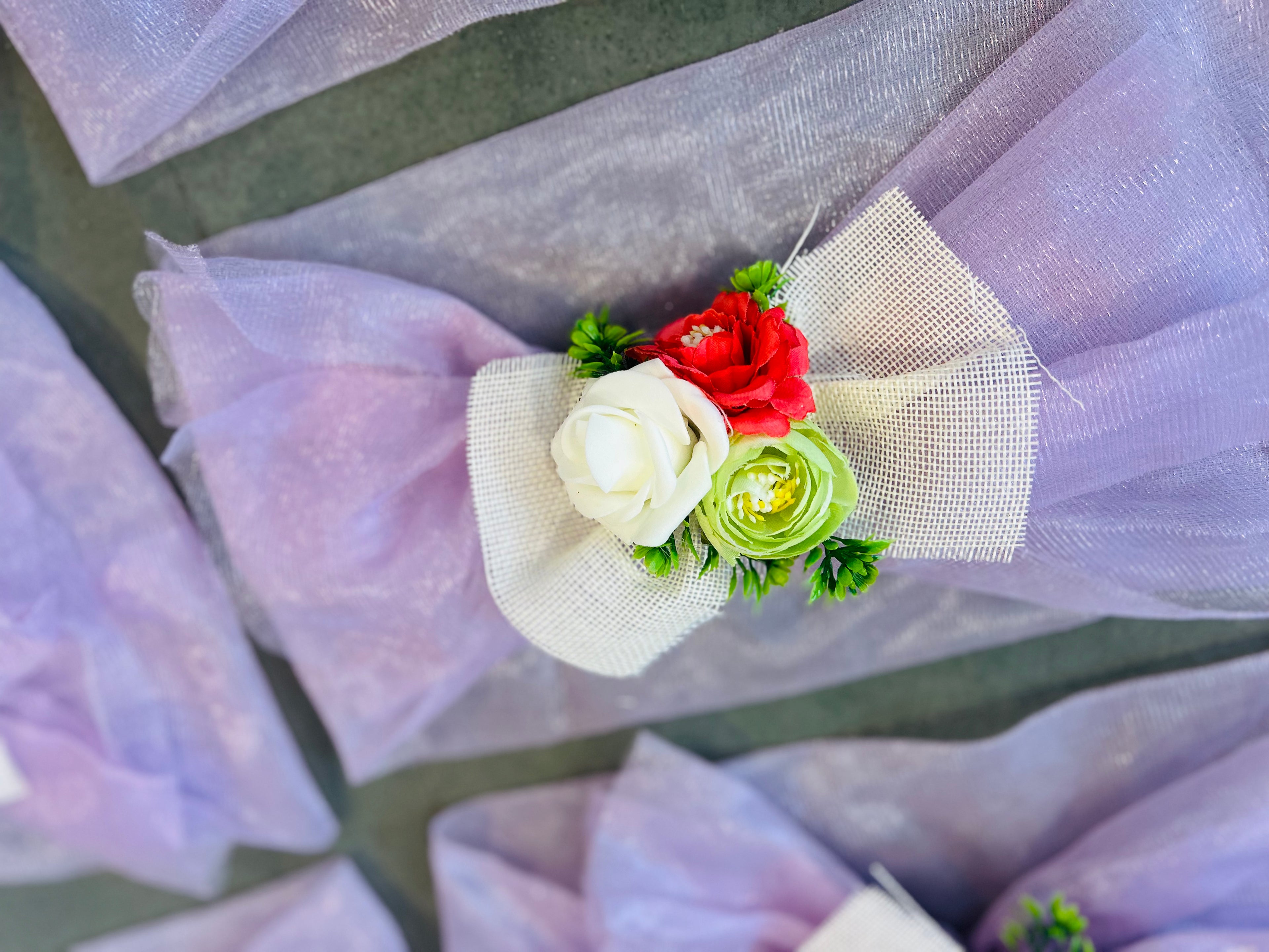 Lavender tissue net tray cover with floral decoration