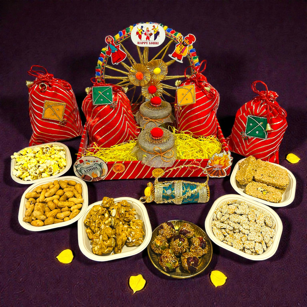 Gota Leheriya themed Lohri tray hamper with traditional festive sweets and snacks.