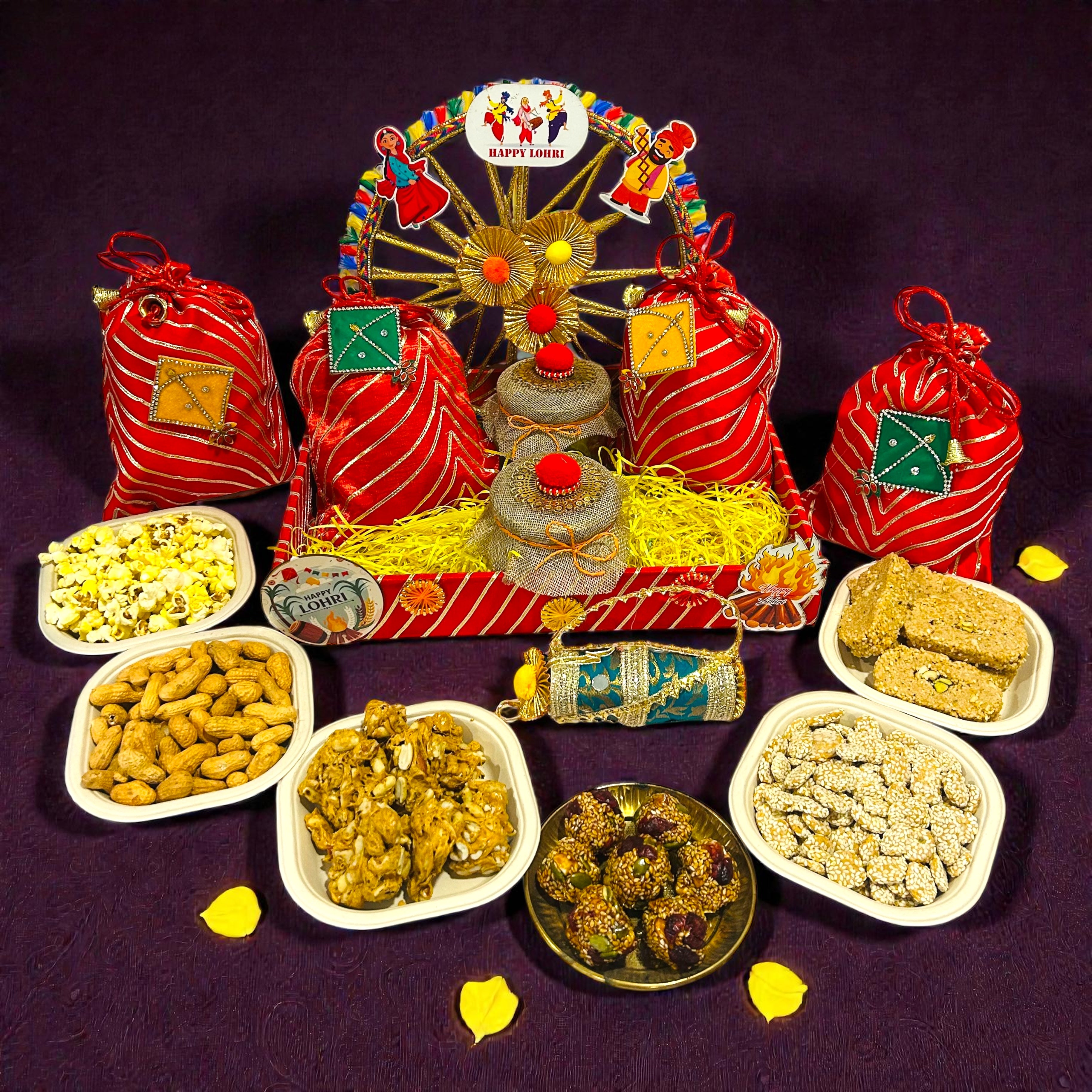 Gota Leheriya themed Lohri tray hamper with traditional festive sweets and snacks.