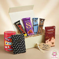 Luxury Chocolate Gift Hamper by Wrap Shap featuring Minis, Dairy Milk Chocolate, Mars Chocolate Bar, Loyka Almond Brittle, Sleepy Owl Coffee sachets, premium notebook, thank-you tag, and an elegant ribbon-tied gift box for birthdays, festivals, corporate gifting, and special occasions.