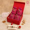 Premium Dry Fruit Trunk Rakhi Gift Hamper by Wrap Shap featuring a designer Rakhi, four premium dry fruits packed in elegant potli bags, roli chawal, personalized note, and a luxury rigid gift box for Raksha Bandhan gifting.