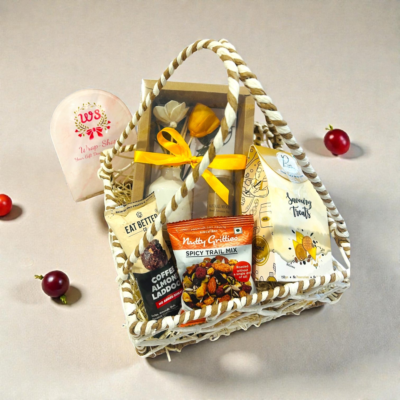 Indian wedding favour hamper with coffee almond laddoo