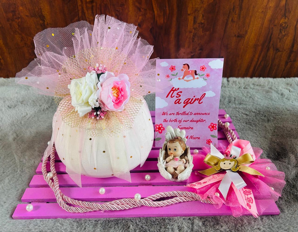 newborn announcement rasgulla hamper in metal jar wooden platter