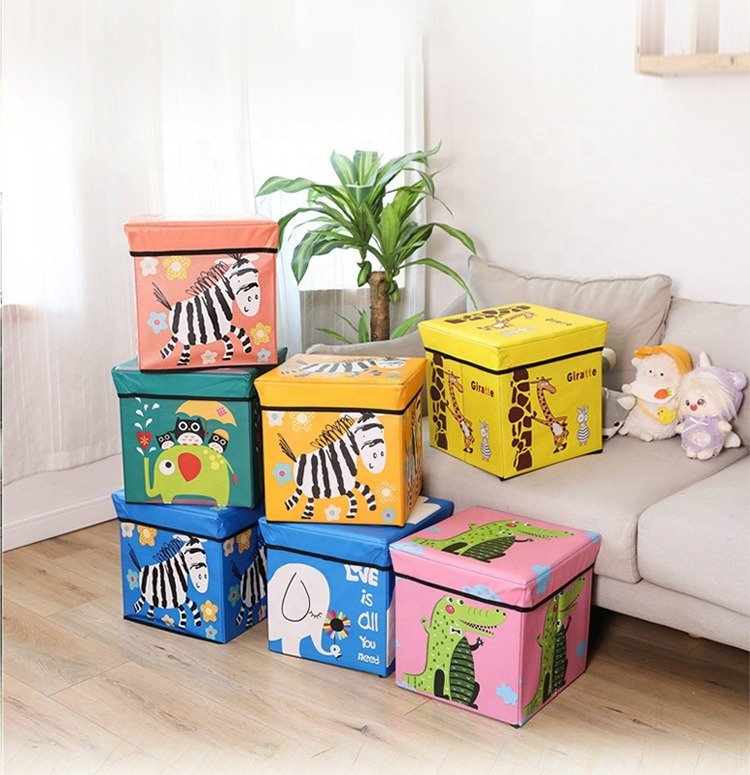 Cartoon-themed foldable storage box organizer for kids, perfect for organizing toys, clothes, and books in a playful manner.