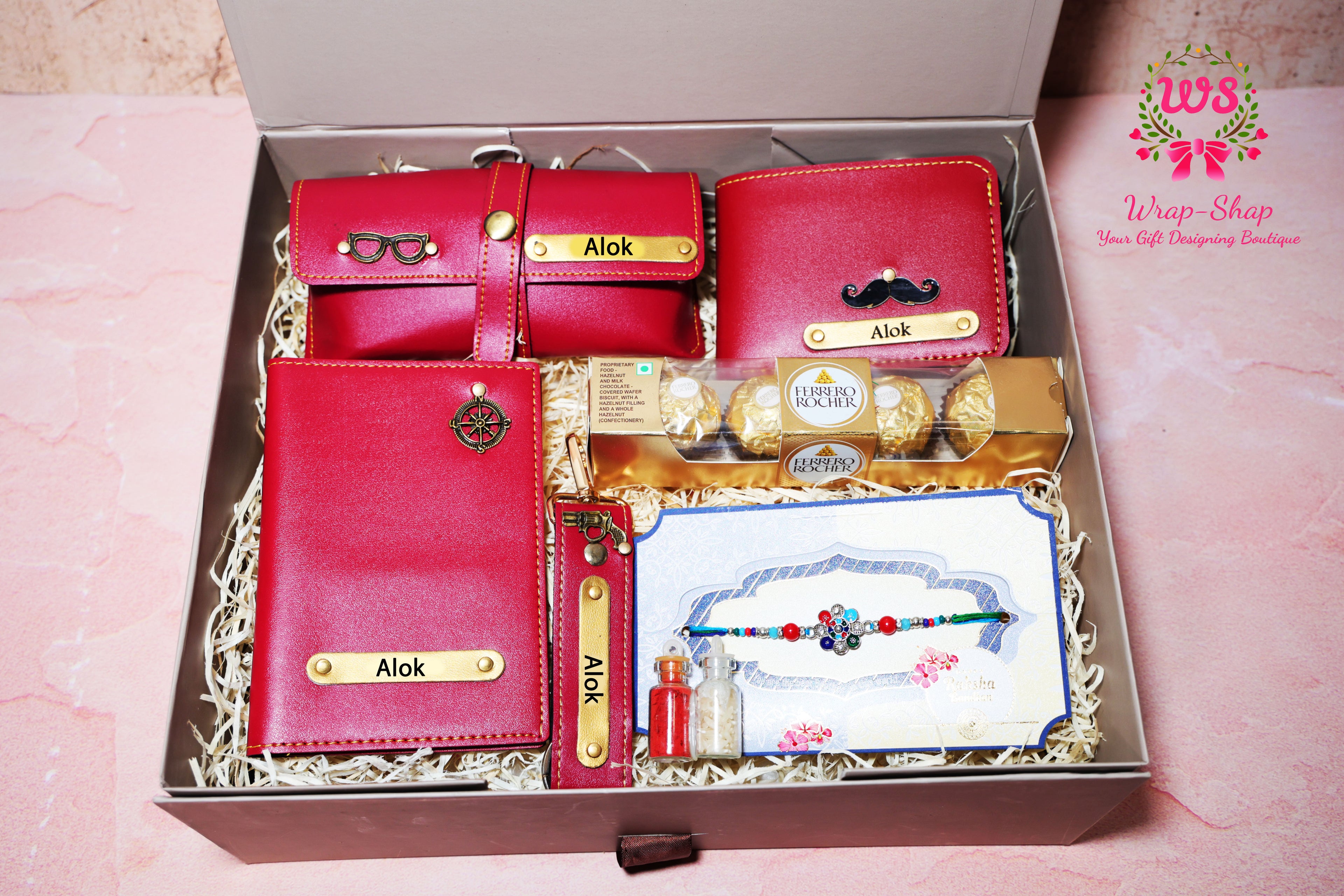Wrap Shap personalized Rakhi hamper for brother with name-engraved watch case, wallet, passport cover, keychain, Ferrero Rocher and Rakhi in gift box