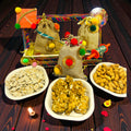 Lohri gift hamper in pine basket with jute potlis of peanut chikki, revdi and moongfali