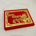 Premium acrylic Lagn Patrika wedding invitation with gold foil engraving, laser-cut detailing, and mirror finish for Hindu, Jain, Marwari, and Gujarati weddings.