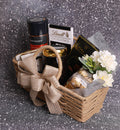 Premium Coffee Chocolate Diwali Gift Hamper featuring Davidoff Coffee, 16-piece Ferrero Rocher, Lindt Chocolate, Bournville Dark Chocolate, coffee-scented candle and decorated jute basket by Wrap Shap.