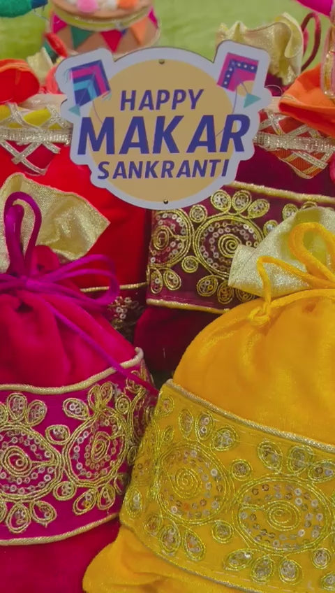 Lohri Celebration Hamper in Decorated Pinewood Basket with Velvet Lace Potli