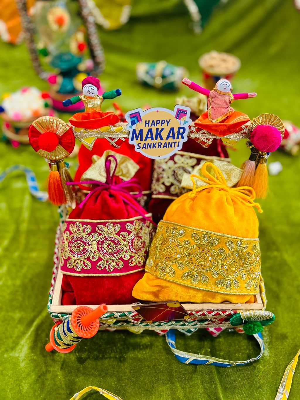 lohri sakranti hamper with potli including moongfali, revdi, gajak popcorn