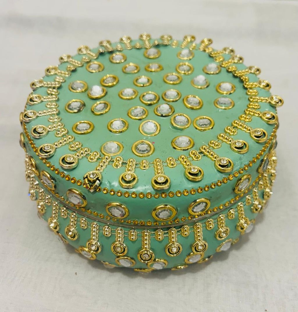 Elegant 6-inch round steel decorated box in pastel green, perfect for wedding sweets, ladoos, dry fruits, chocolates, and festive return gifts.