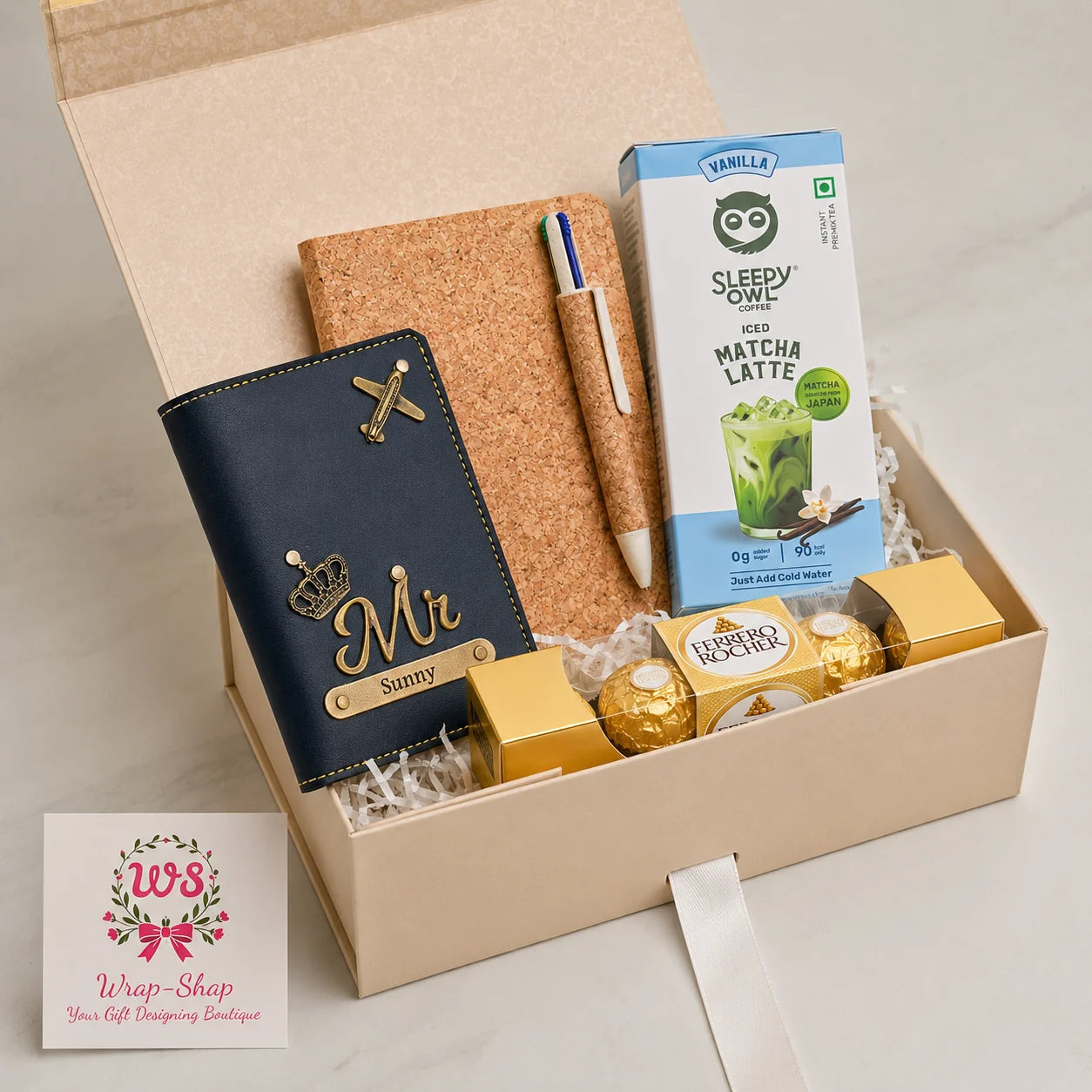 Personalised student graduation and exam success gift hamper with passport holder, cork diary, pen set, coffee and Ferrero Rocher chocolates in a premium gift box by Wrap Shap.