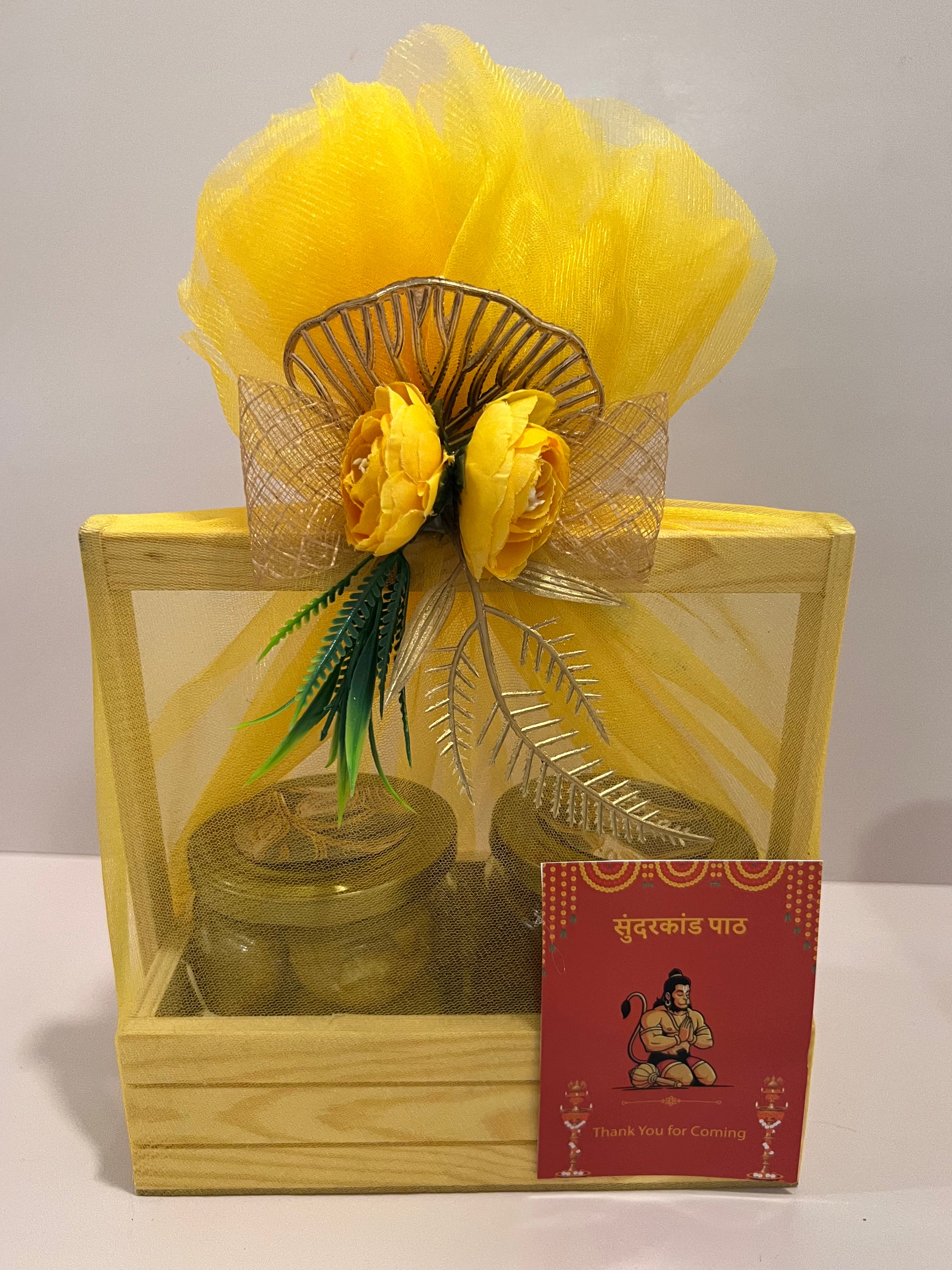 sundarkand return gift hamper with cookies and beetroot chips in wooden basket