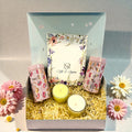 Wedding invitation gift box with dry fruits in tin jar and premium scented candles