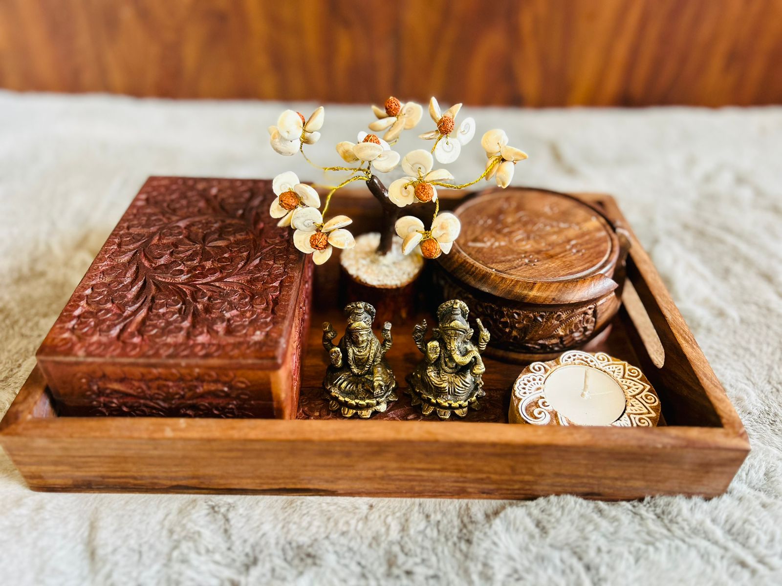 Premium wooden Diwali hamper with brass Laxmi Ganesh, wooden coasters, dry fruit box, stone tree, and block print diya
