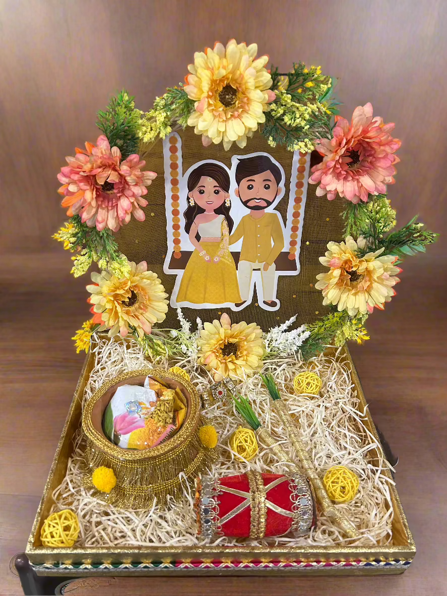 Decorated haldi platter in a tray with floral backwall, boy & girl cutouts, haldi pot with powder – Wrap Shap wedding haldi decor tray