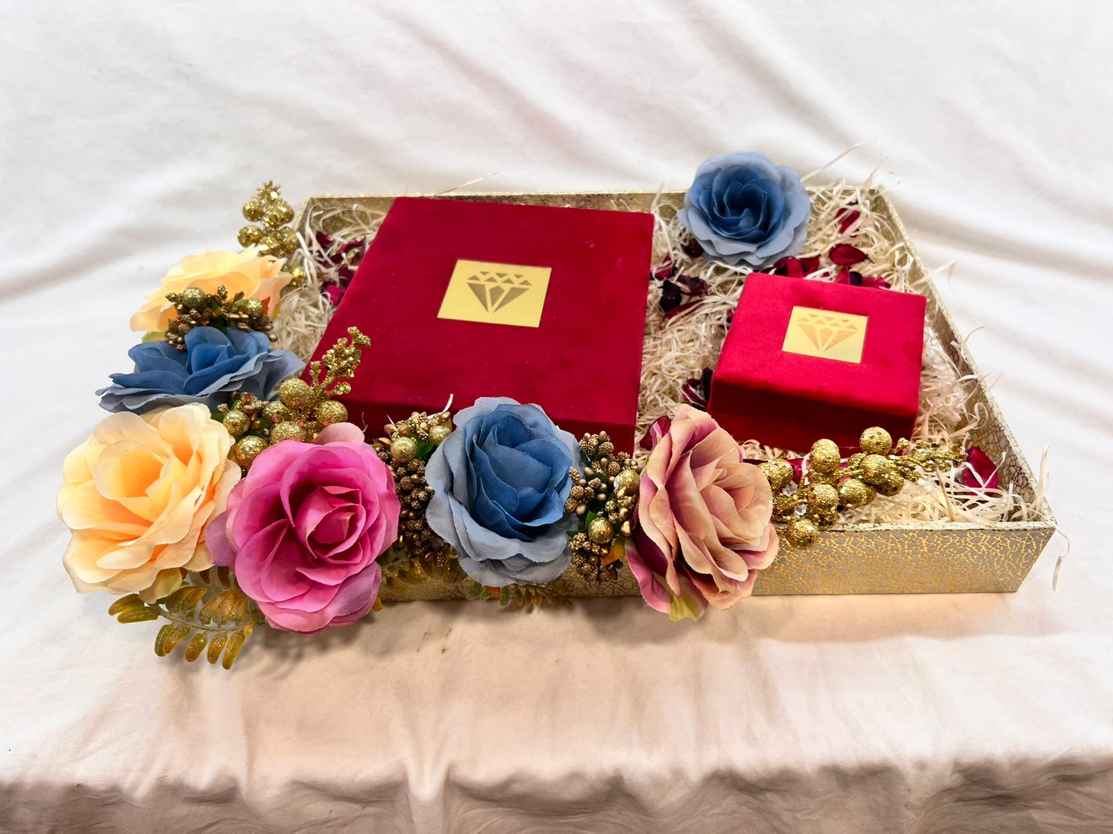 Wrap Shap jewellery platter with big artificial roses, includes empty jewellery set box and bangle box.