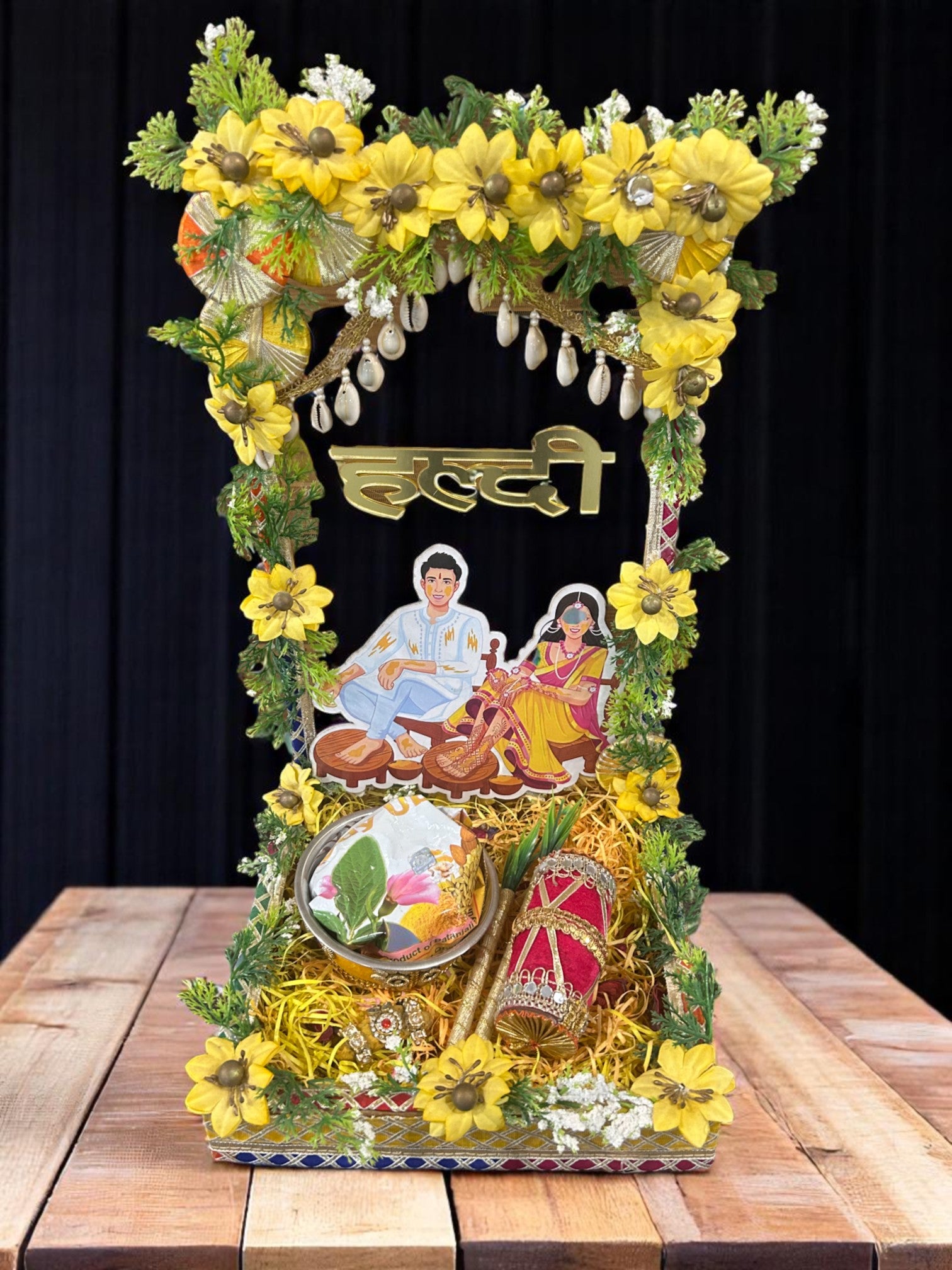 Large pinewood Haldi tray with standing back, Haldi cutout, pearl hangings, yellow flowers, steel bowl, and haldi powder – perfect for wedding rituals by Wrap Shap