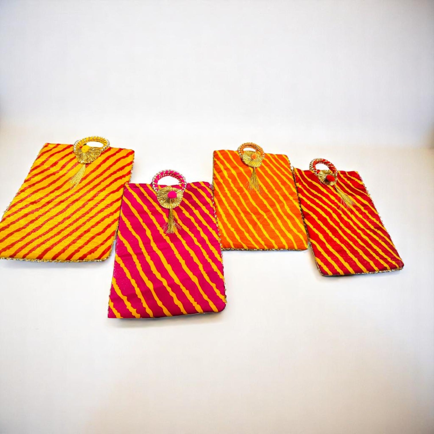 Leheriya print gifting bag in assorted colors with zipper and fabric handle – perfect for return favours and ethnic gift packaging by Wrap Shap