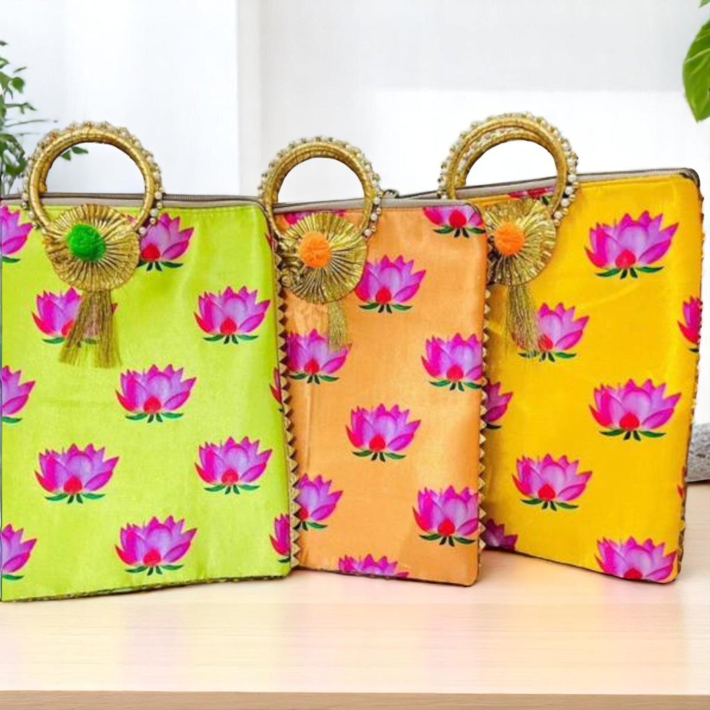 Wrap Shap lotus print gifting bag with round handle in assorted festive colors for return favours and Indian celebrations