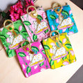 Traditional Pichwai print gifting bag with cloth handle in assorted colors by Wrap Shap, ideal for wedding favours and festive small gifts