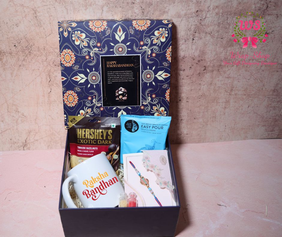 Wrap Shap Rakhi hamper with custom printed mug, Blue Tokai coffee pack, Hershey’s chocolate and Rakhi in premium gift box