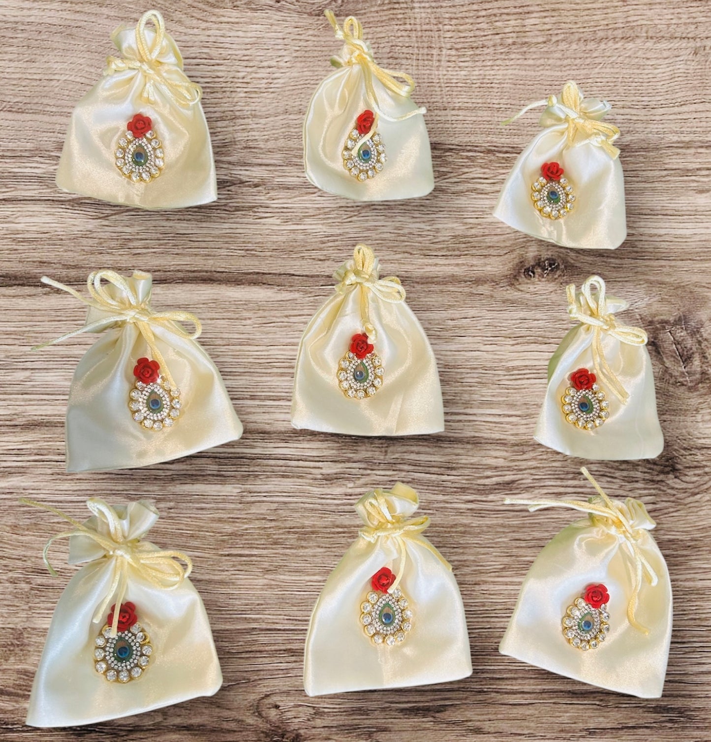 Small satin potli batwa bag with gota booti work by Wrap Shap, ideal for 100gm dry fruits, coins, jewellery or festive return gifts – assorted colors