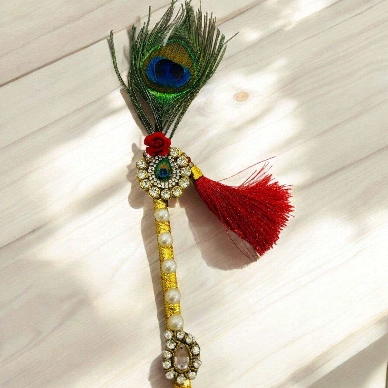 Small tilak stick with morpankh design used for applying roli or kumkum in weddings and poojas by Wrap Shap