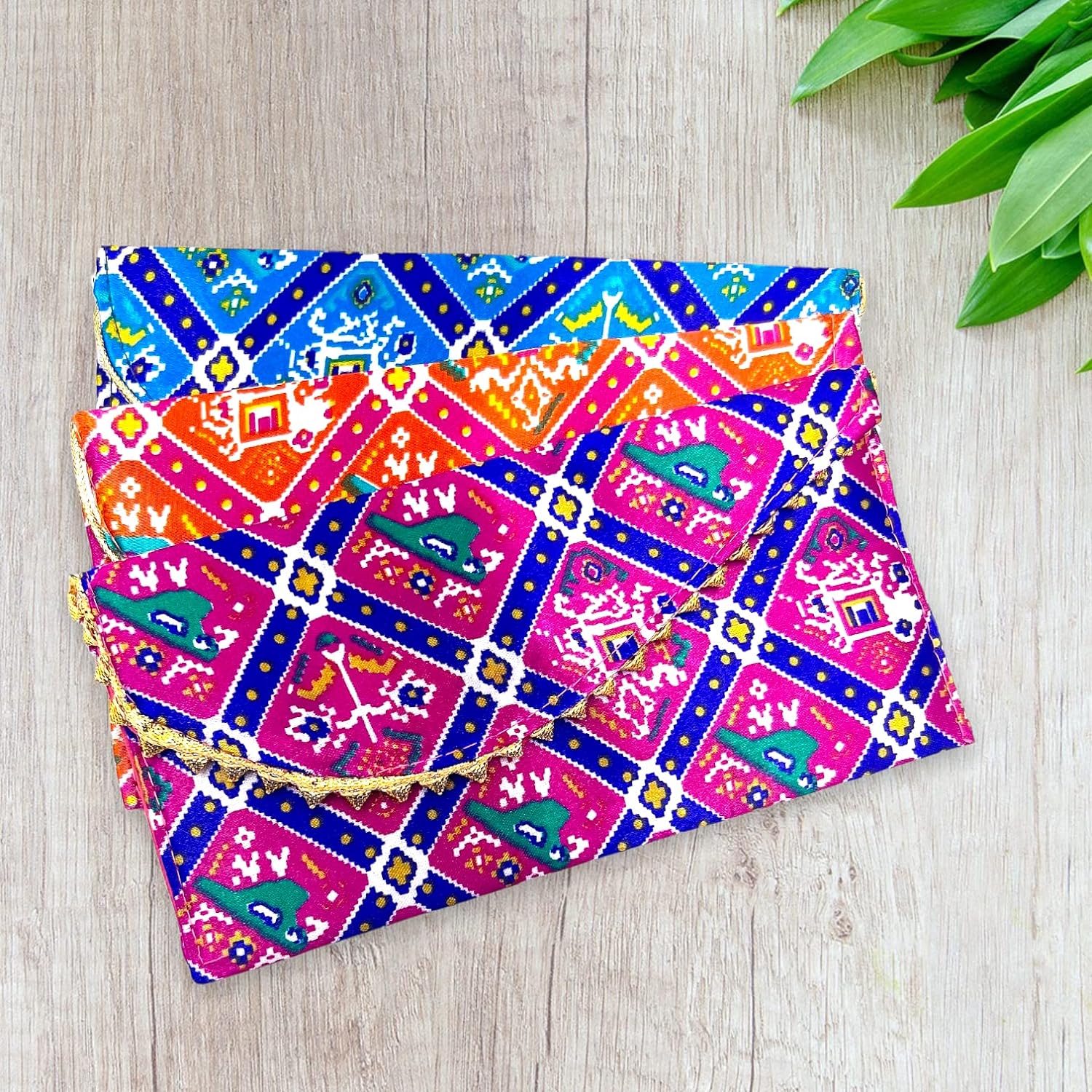 Traditional Patola-printed shagun money envelope for weddings, engagements, festive gifting, and cash gifts, available in assorted colors